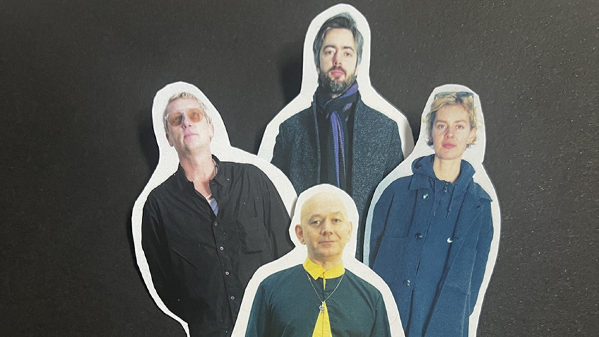 The upper half of pictures of four people on cut out paper.
