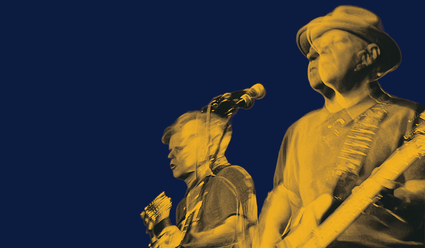 Two musicians playing guitars on stage, shown in yellow tones against a dark blue background with motion blur.